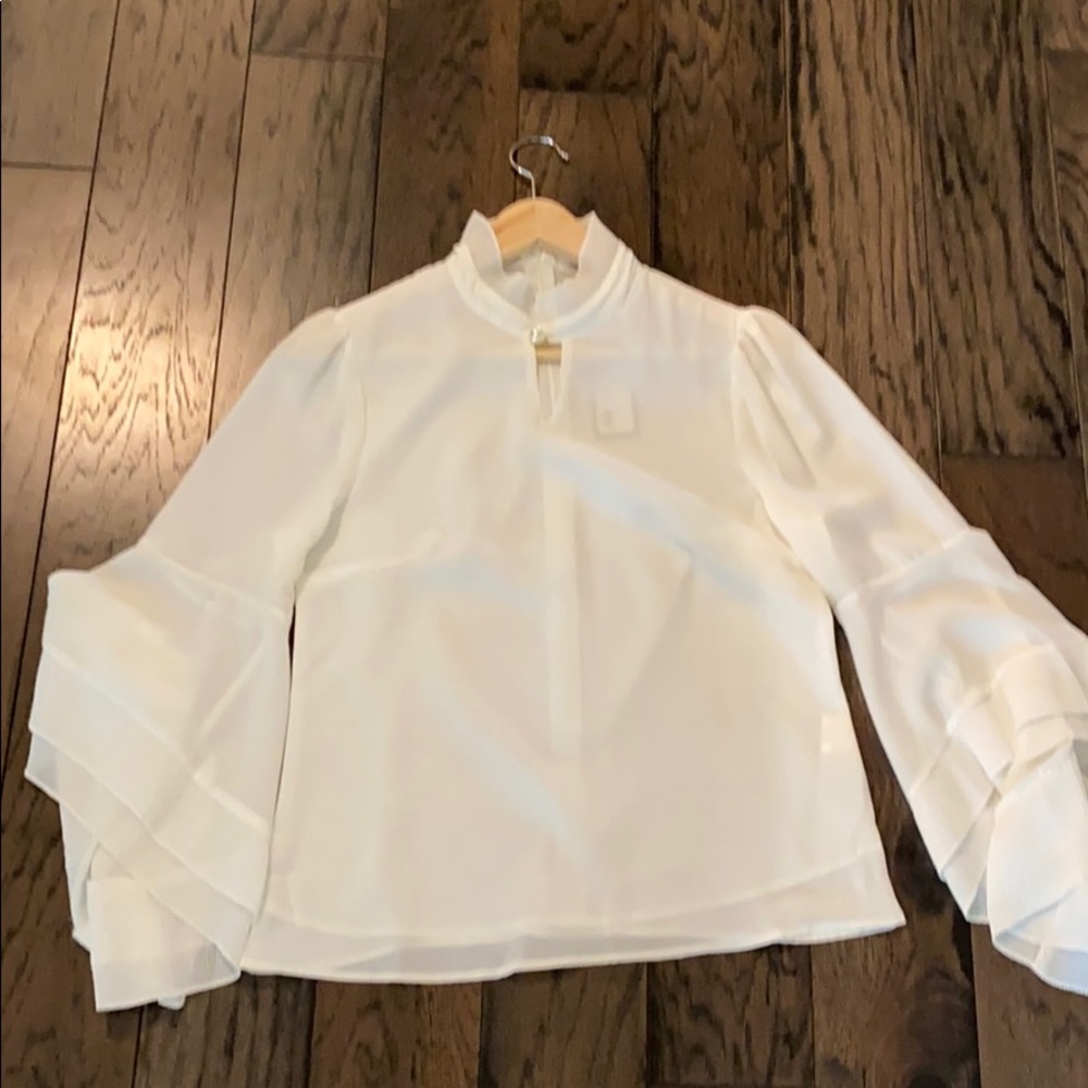 Beautiful white blouse.